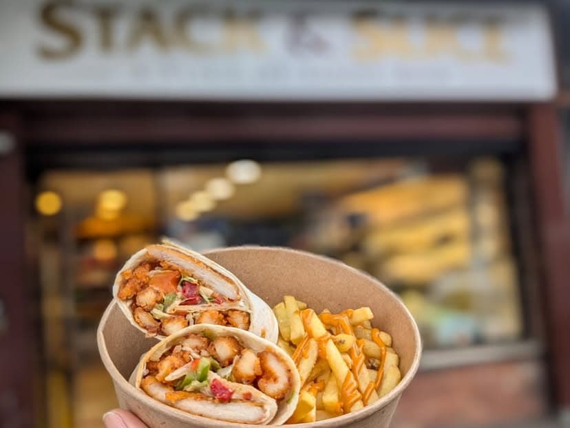 Loaded wrap and fries outside Stack & Slice on Sandy Row